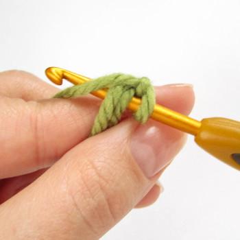 Make a loop an inch from the yarn end.