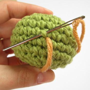 knot the yarn tail and hide it inside a