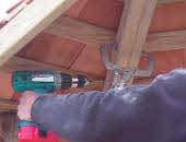 Step A2 Place the second roof section next to the first. Using 2" screws, fasten rafters together. (See Figure A1d.