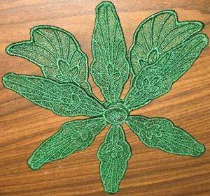Arrange the leaf shape pieces as shown,