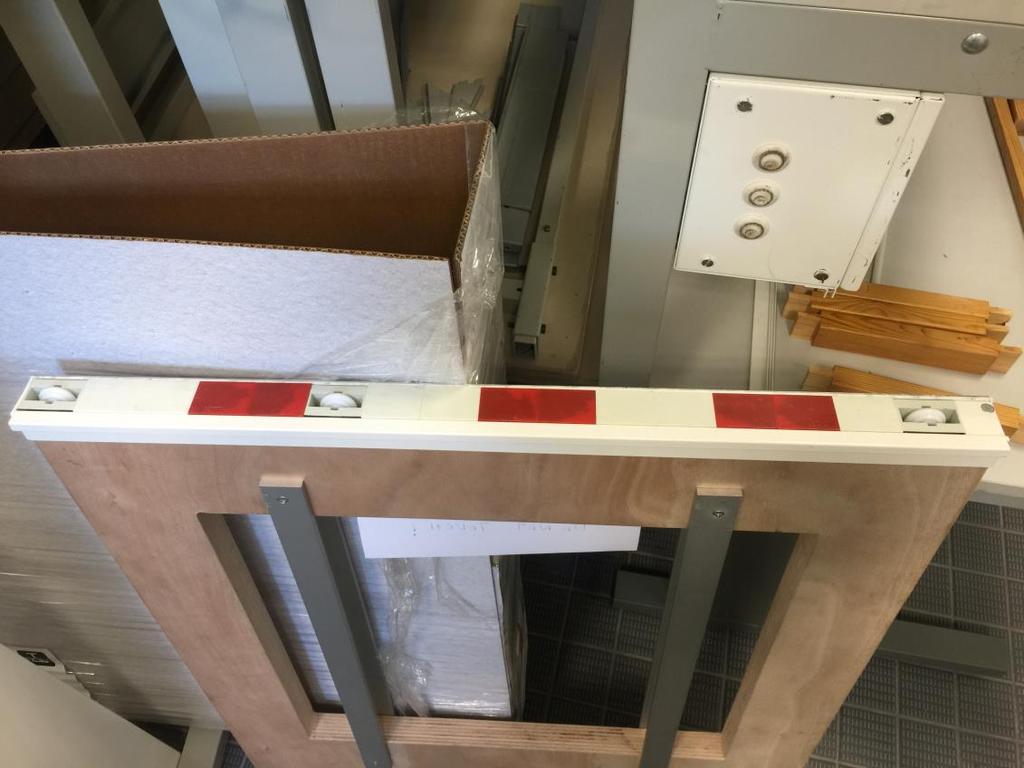 The Secondary block was embedded inside the door itself and contained Permanent Magnets that keeps the door hanging while there is no power and the same