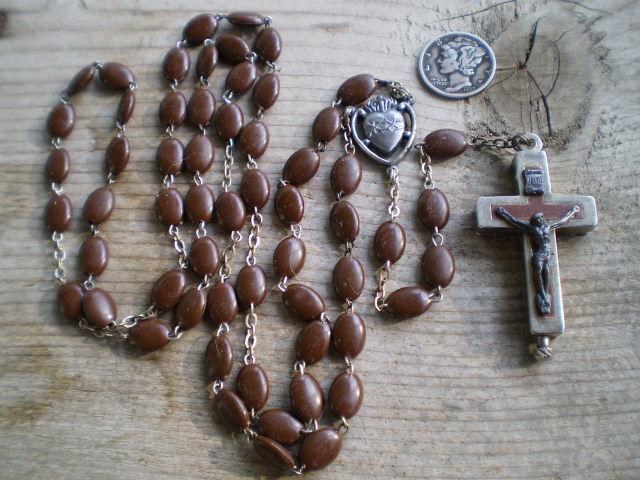 00 Old Faux Spina Cristi Bead Rosary with Reliquary Crucifix Nice old Italian rosary with a reliquary crucifix containing soil from the catacombs of Rome.