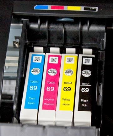 and includes a built-in high-resolution flat-bed scanner for standalone copying of documents and photos. Ink System: Four inks. Epson DURABrite Ultra pigmented Cyan, Magenta, Yellow, and Black.
