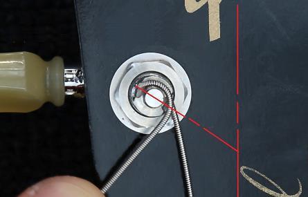 Looking at the top of the headstock with the bass strings toward the left, the machine head s right recess should be between 4:00 and 5:00 o clock, and the left recess between 10:00 and 11:00 o clock.