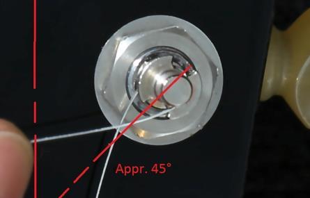 String slot shaft (where to feed the string up toward the thread) with an approximate 45 degree angle. 5.