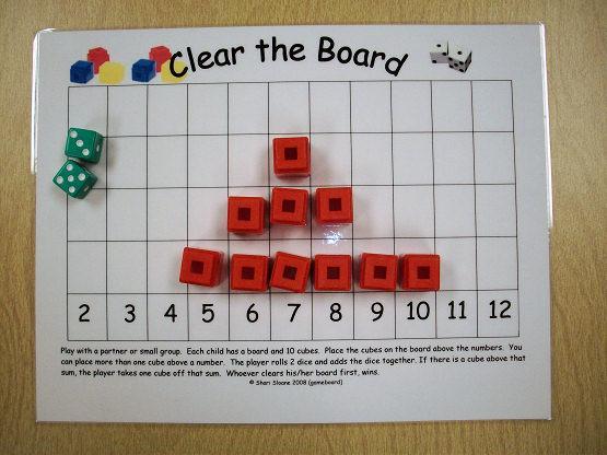 for each player gameboard (http://www.kidscount1234.com/) 2 dice 10 cubes How to Play: Play with a partner. Each one has a board and 10 cubes. Place the cubes on the board above the numbers.