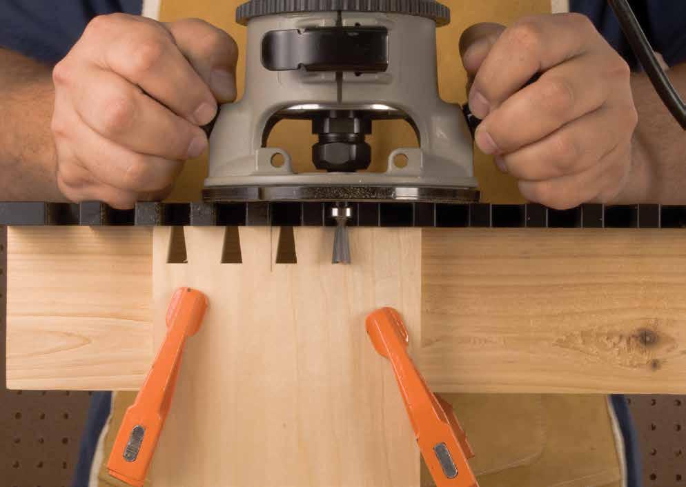 Place your router flat on top of the dovetail jig surface with the bit in between one of the openings. Be sure the cutter is not contacting the wood surface before turning your router on.