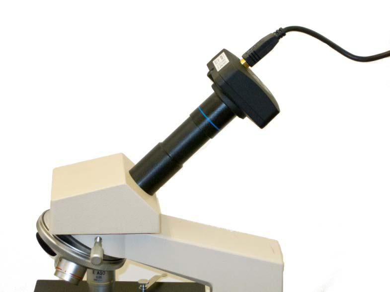The camera is designed to replace the ocular lens (see image below). It can also be placed in a trinocular tube, or can replace the eyepiece in a dissecting scope or spotting scope.