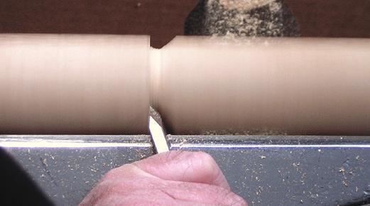notches in the marking board parallel to the grain of the top veneer.