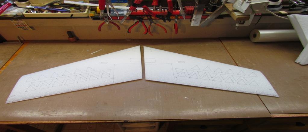 It has the placement laid out for the radio, battery, control surfaces and motor cut outs.