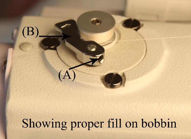 See figure 89 and 90 Note you do not need to pull the bobbin winder out to adjust this setting.