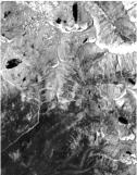 Visible to Middle Infrared Image Bands Blue (TM 1): Provides maximum penetration of shallow water bodies, though the mountain lakes in the left image are deep and thus appear dark, as does the