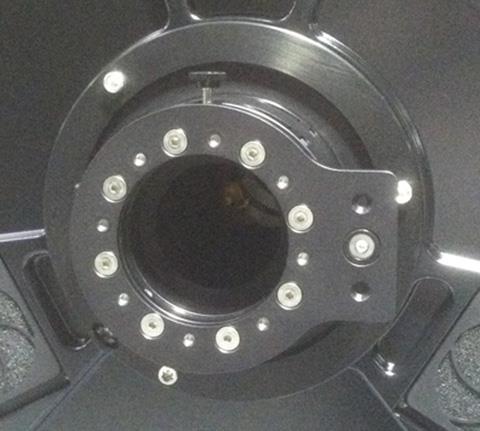 The secondary mirror is movable to allow fine collimation and to set the spacing between the primary and secondary.