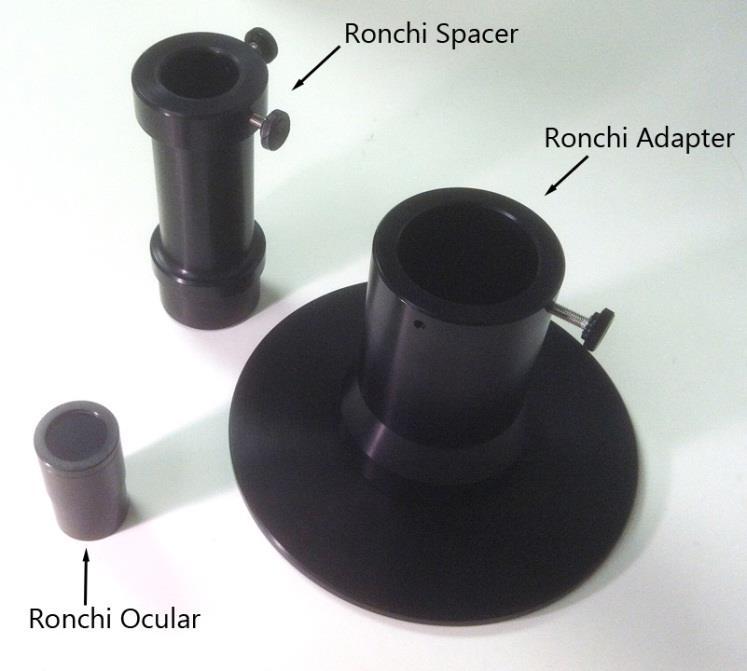 b. Remove focuser from the back plate of the telescope. c. Place the Ronchi Adapter in the back plate of the telescope and replace the focuser retaining ring to hold the adapter in place.
