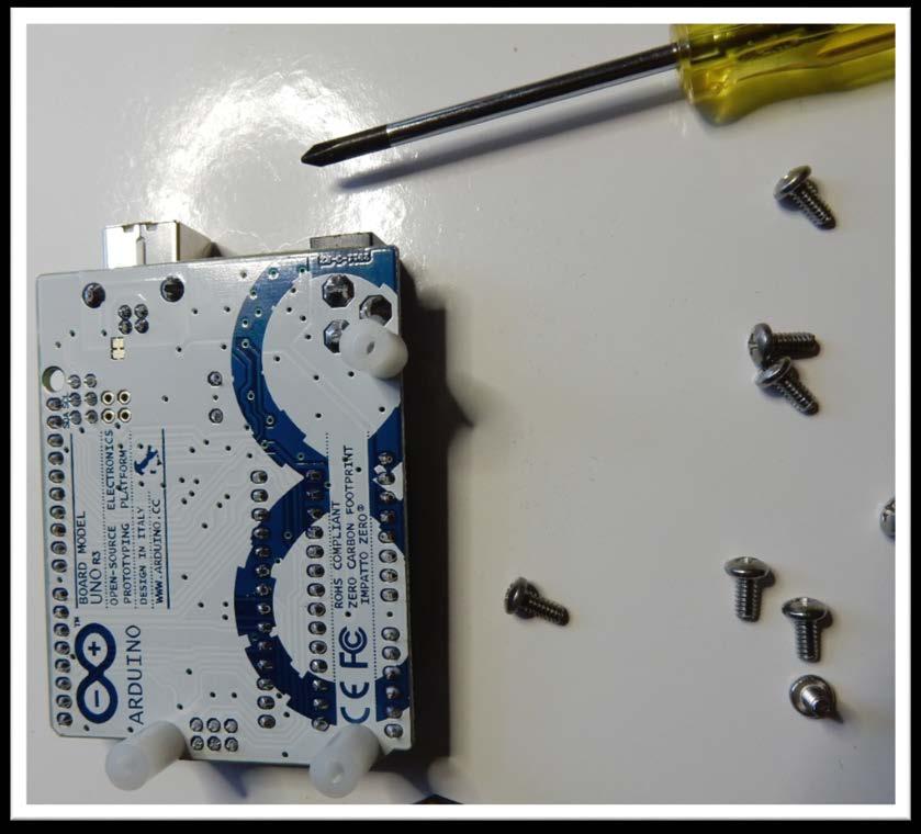 screwdriver Use the 3 plastic spacers and three ¼ inch screws and