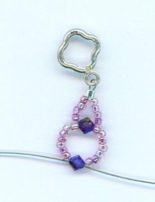 6. Now you ll put 7 seed beads on each wire, and on one wire, you ll also string on a crystal like you did before.