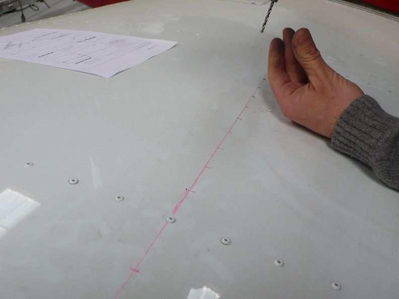 Mark the location of the rivet holes along the