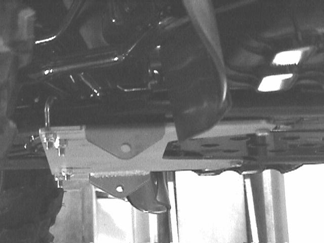 Frame Mount Installation Continued For 2002 or newer models, attach the mount using the center slots.