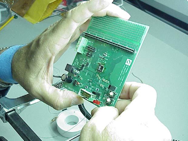 Hand inspect the board using 4X magnification (or higher) for shorts or marginal solder joints.