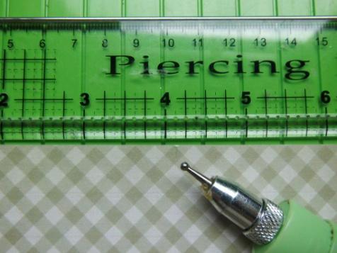 an embossing tool and a ruler if not. Step 5. Find the 4 1/8 measurement.