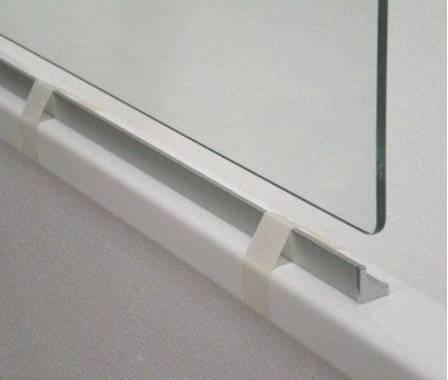 3. Apply a continuous bead of Clear RTV along the bottom of the Door sill and in the Chrome