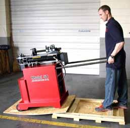 2) Removing the bender with a forklift: The bender may be lifted from the base using a forklift by inserting the forks into the forklift access slot as shown in the above picture.