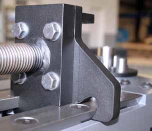 Tool Plate Installation The Model 54 has been designed to allow new tooling to be easily added in the future. This is accomplished by using a tool plate that bolts to the pressure screw block.
