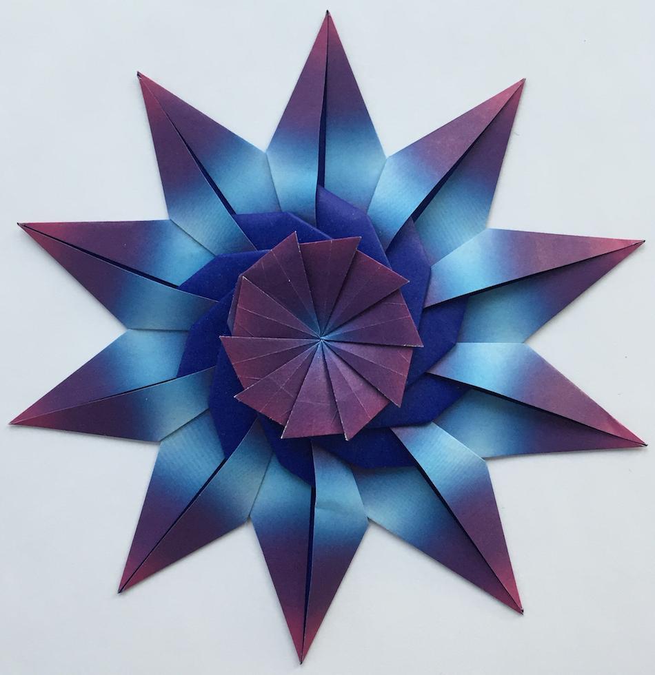Introduction Figure 1: Pentagonal and decagonal stars Star origami models are popular, especially around some holidays. They are often admired for their symmetries and repetitive patterns.