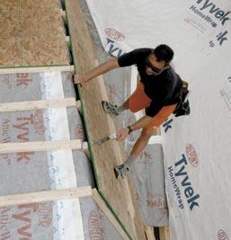 the overlying course of Tyvek AtticWrap TM. Install roof sheathing over furring strips. Follow the same sequence until you reach the ridge.