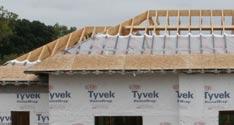 THE SEALED ATTIC SYSTEM WITH DUPONT TM TYVEK ATTICWRAP TM PROVIDES A WEALTH OF BENEFITS Helps cut overall cooling and heating costs Radiant heat gain in the attic during summer adds to cooling costs.