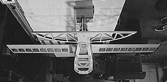 Position the stabilizer on the fuselage, centered and aligned at the rear edge of the fuselage top, leaving the ½ gap between the fuse sides open.