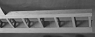 Using a razor was as shown, cut the 1/16 sheeting and the R3 ribs up to the R2 rib. Now cut in the 1/16 space between the aileron R5 rib and R2 rib to free the aileron.