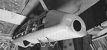 Position (2) screws about ½ down from the side edge of the cowl, and (2) from the back side, from inside the landing gear area into the cowl ring