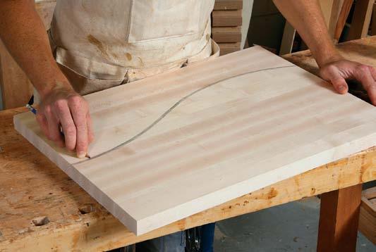 wood movement, I keep the inlay curve roughly parallel with the grain of the cutting board.