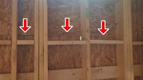 (2) Two horizontal joints in the OSB wall sheathing on