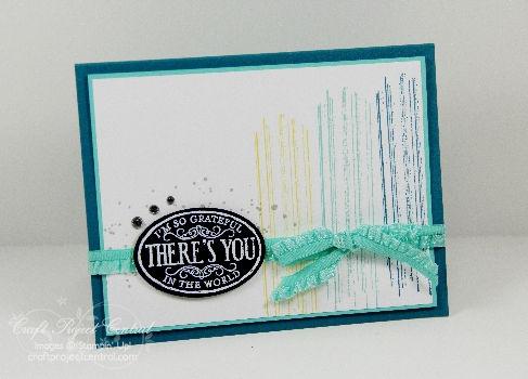 Step 11 Take the Whisper White card stock from Step 10 and stamp the sketchy lines onto the right side of the card stock in Island Indigo, Coastal Cabana, and Daffodil Delight ink.
