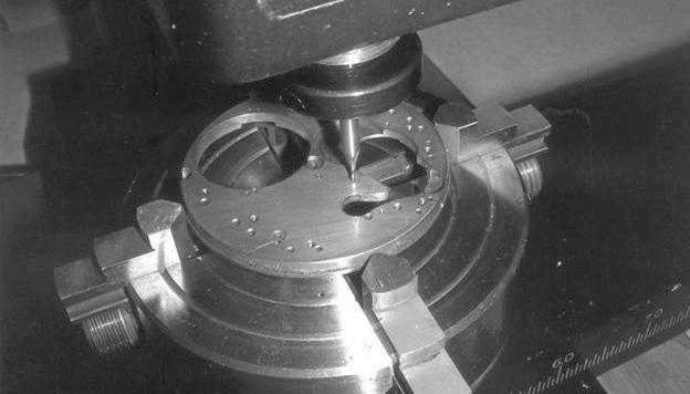 The Added Benefit of Using a Mill for Your Bushing and Depthing From time to time one will encounter pivot holes that are very close to the edge of the movement plate as shown in photo #8.