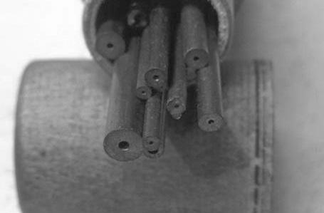 In use, one must normally machine their own bushings from bar stock or bushing wire as shown in photo #13.