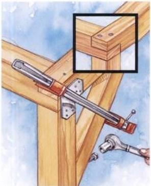 4. Set the 120" beams on top of the short beams, and check the side walls for squareness. Secure each half-lap joint with two 60d nails.