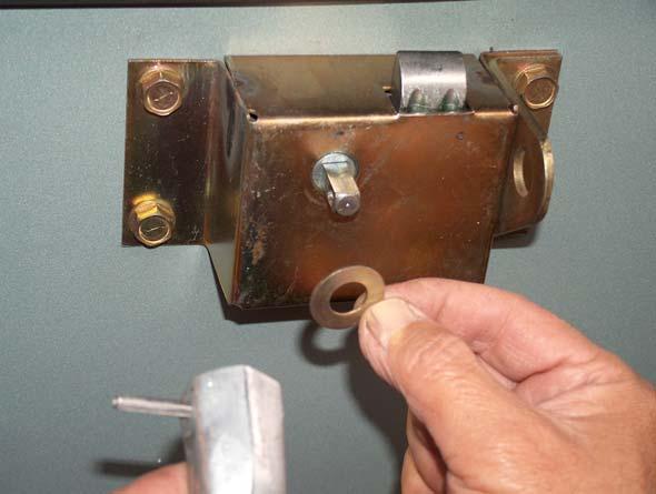 4) Once the pin has been removed from the handle, pull out