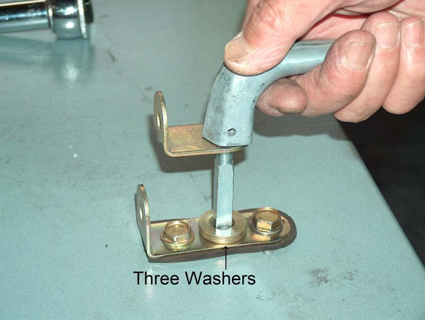 hole, the three washers, and lock on the