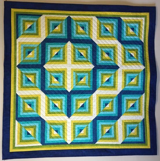 Learn this surprisingly easy illusion quilt using the strip-piecing method.