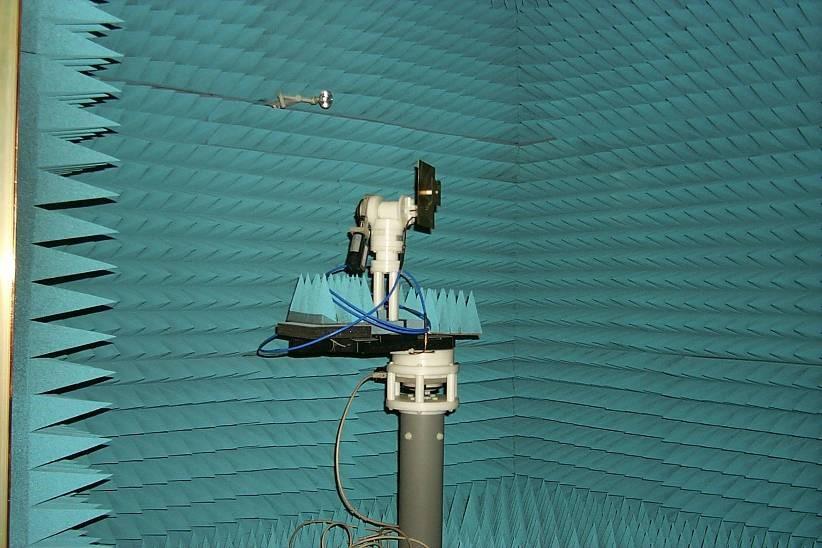The AUT has a 2 axis precision roll-over-azimuth positioning system, and the possibility of a precision horizontal translation, as shown in fig.6. Fig.6: AUT in the mmw anechoic chamber.