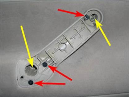 6. Remove the two T20 Torx screws at the bottom of the door. 7. Starting at the bottom of the door, pull the door panel away from the door, as shown below.