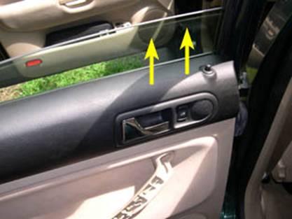 You can rest the door panel back into the window seal if you want to take a break or reach for a tool. 11. Next you need to disconnect the door lock cable from the door unlock handle.