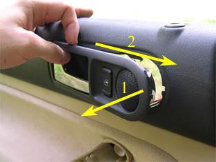 Once the front edge of the handle assembly is pushed out (1), slide the assembly toward the front of the car to remove (2). TRIANGULAR INSERT ON QUARTER WINDOW DIVIDER 17.