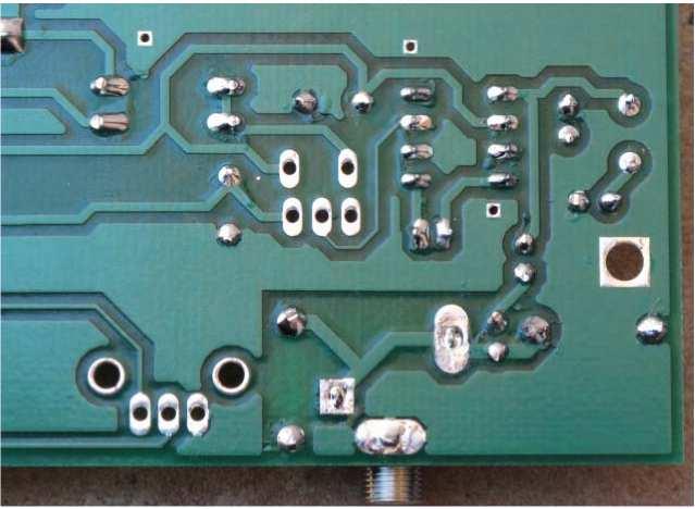 soldered pins. fl Install C13, a 10 uf capacitor. Make sure the - polarity band is oriented as shown above. Figure 24.