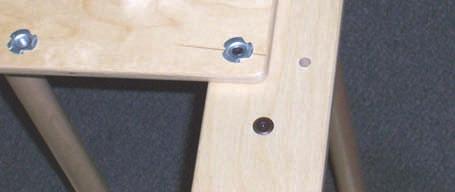 Position the top and bottom so that the three bolt holes in the bottom of the top section will be aligned with the three t-nuts in the top of the bottom section.