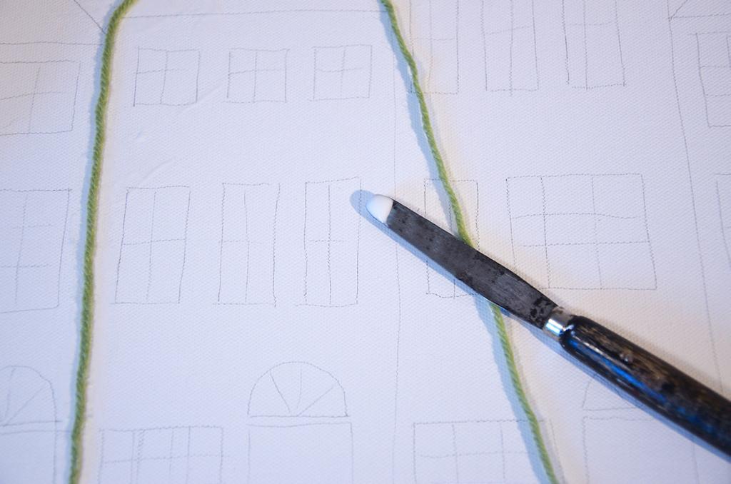 Glue the yarn over the sketched outlines (Figures 3 and 4).