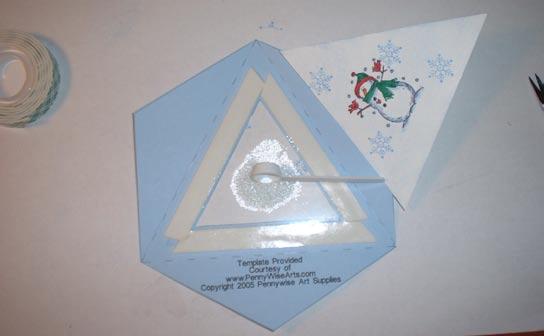 Carefully fill center triangle with micro beads, being careful not to